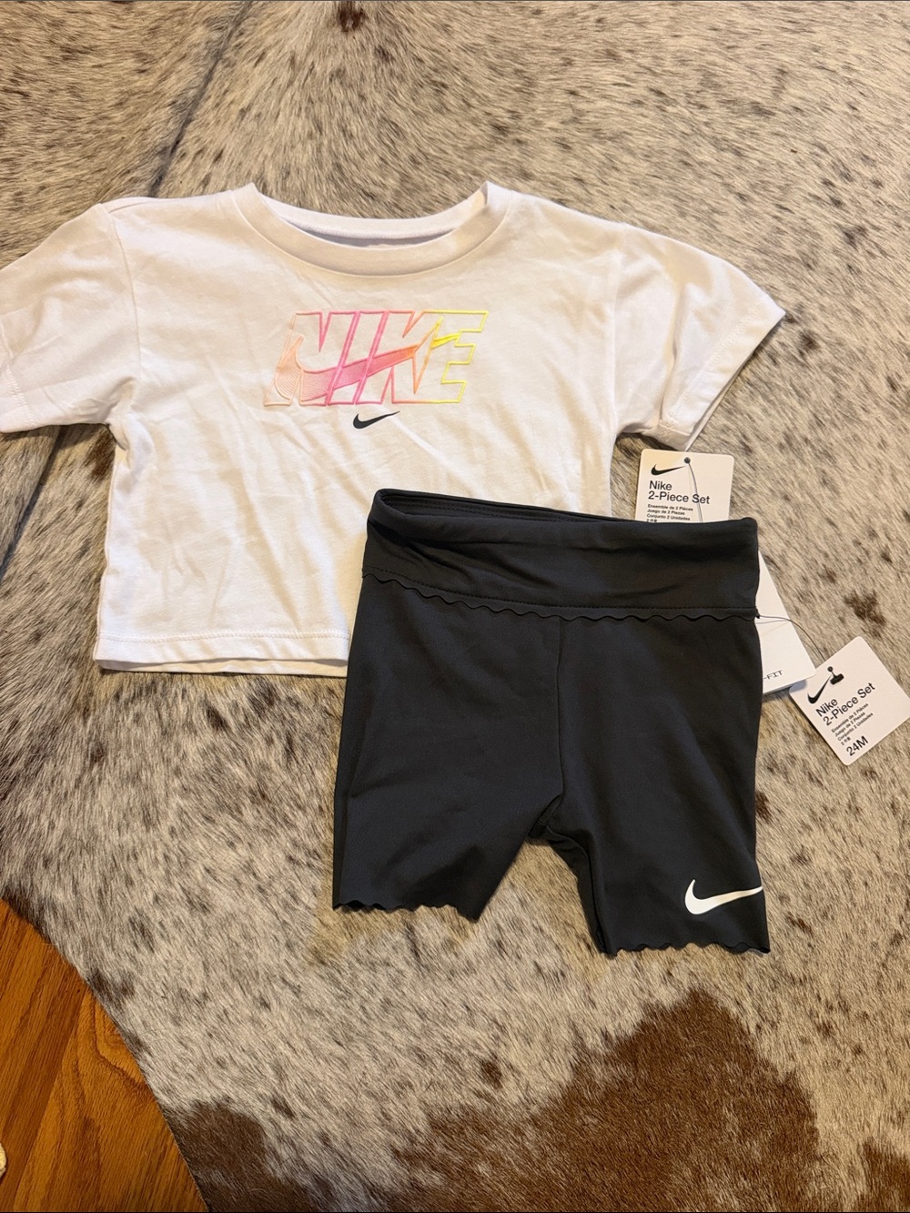 Nike Girls White Crop Tee with Pink-Yellow Gradient Logo & Black Bike Shorts